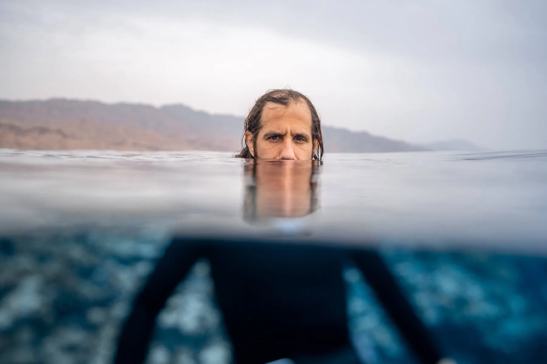 Aaron Fisher at the ocean waterline